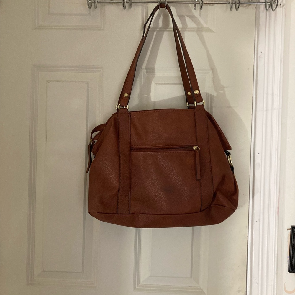 It is a brown purse